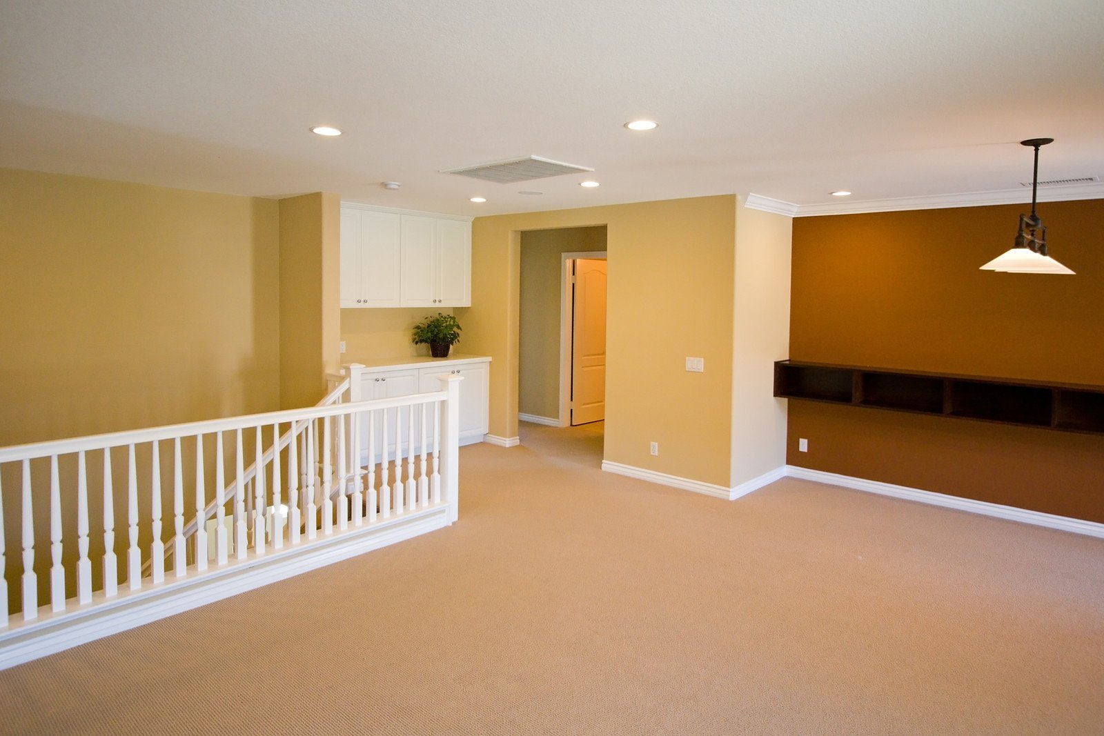 A freshly painted interior with white railing
